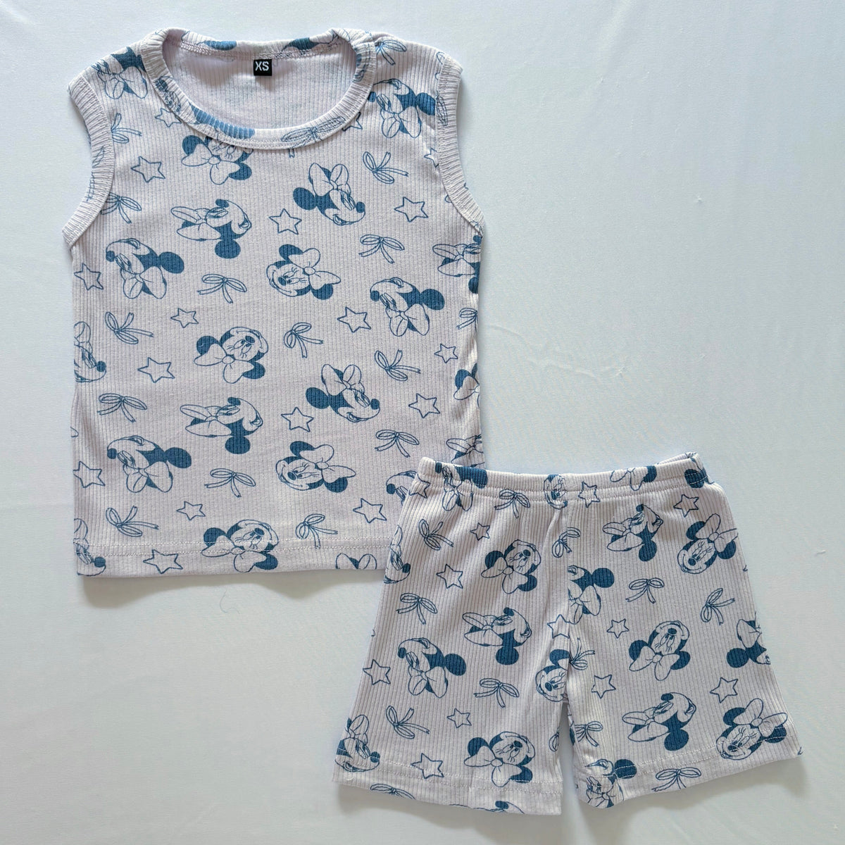 Bow & Bloom Ribbed Cotton Sleeveless Co-ord Set for kids in Lavender with Blue bow-inspired print - Front View.
