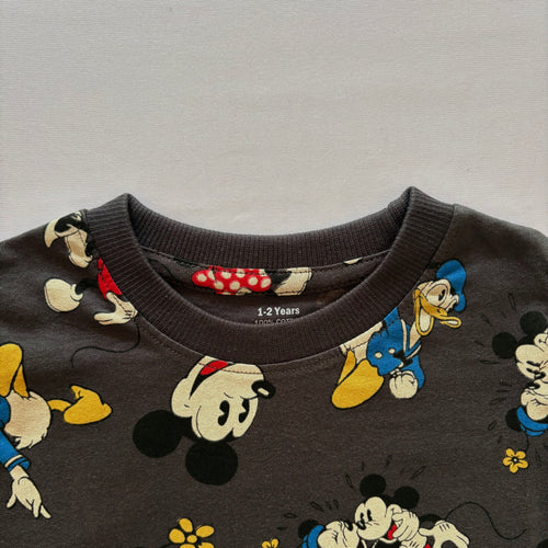 Close-up of the neckline on the Cartoon Carnival Cotton T-shirt.