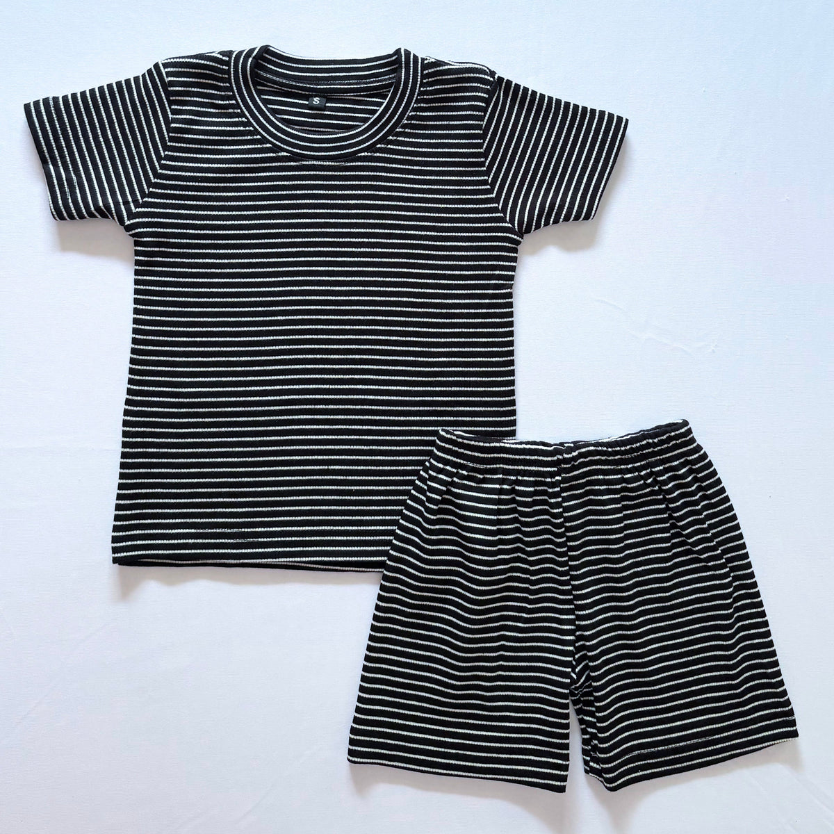 Classic Stripes ribbed cotton co-ord set for kids in black with white horizontal stripes - Front View.