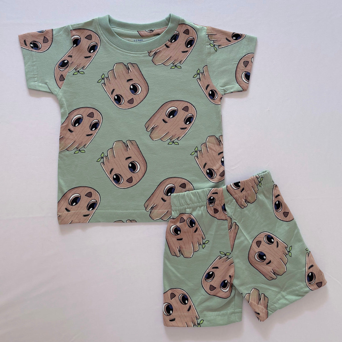 Forest Buddy Cotton Co-ord Set for kids in Mint Green with cute tree character print - Front View.