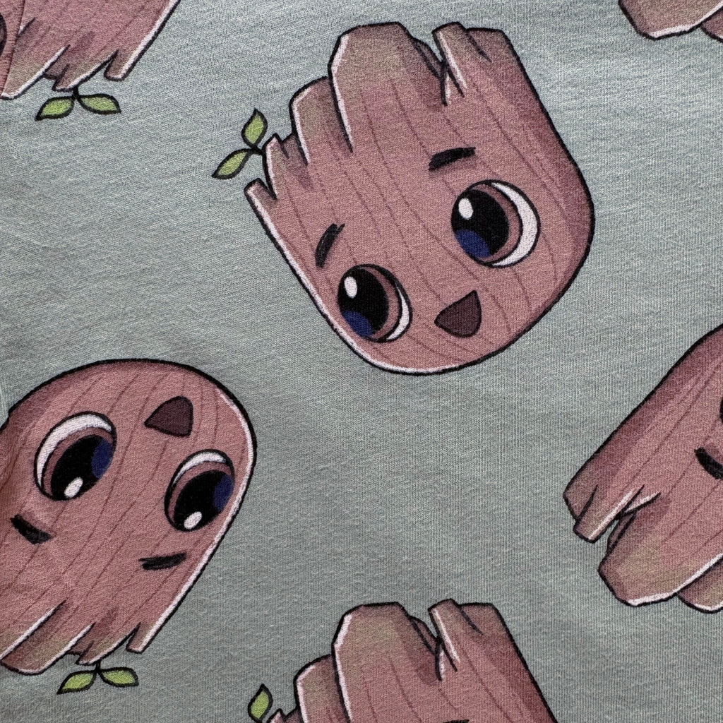 Close-up of the cute tree character print on the Forest Buddy Cotton Co-ord Set.