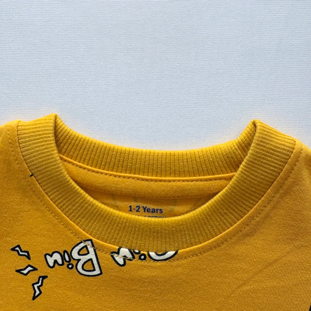 Close-up of the neckline on the Hero Squad Cotton T-shirt.