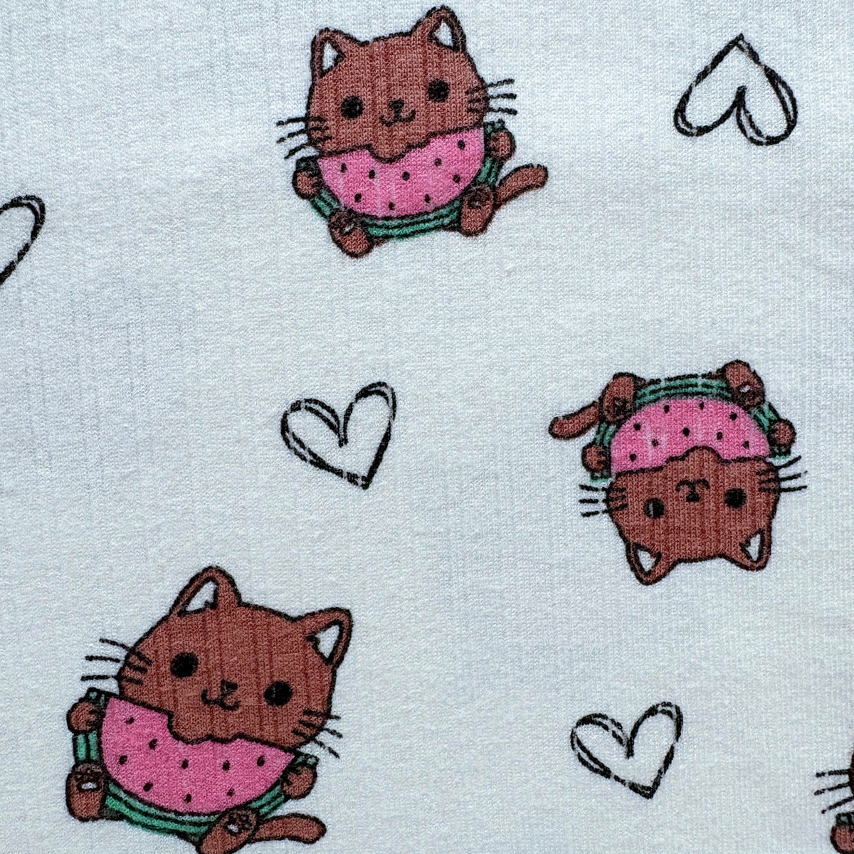 Close-up of the cute kitten and heart print on the Melon Mews Ribbed Cotton Sleeveless Co-ord Set.