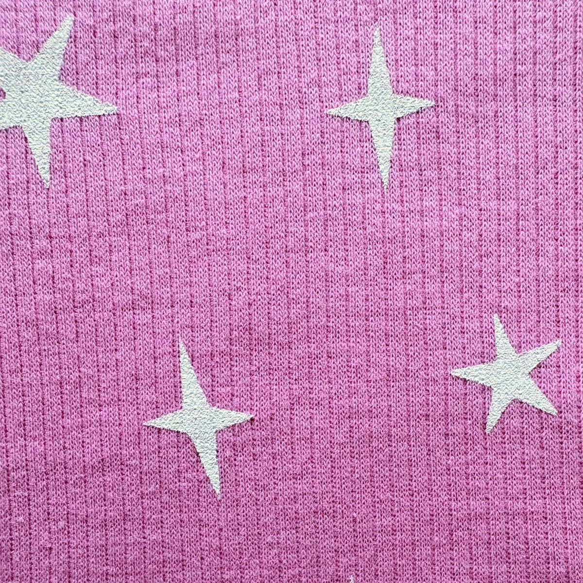 Close-up of the white star print on the Twinkle Tales Ribbed Cotton Co-ord Set.