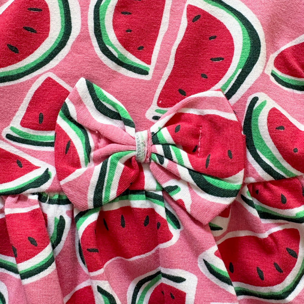 Close-up of the Watermelon Print and Bow on the Watermelon Splash Cotton Frock.